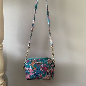 Steve Madden. Blue with flowers and gold accents